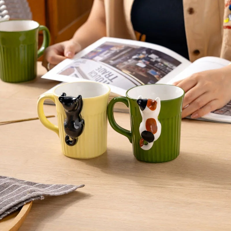 Cute Climbing Cat Ceramic Mug - Image 1
