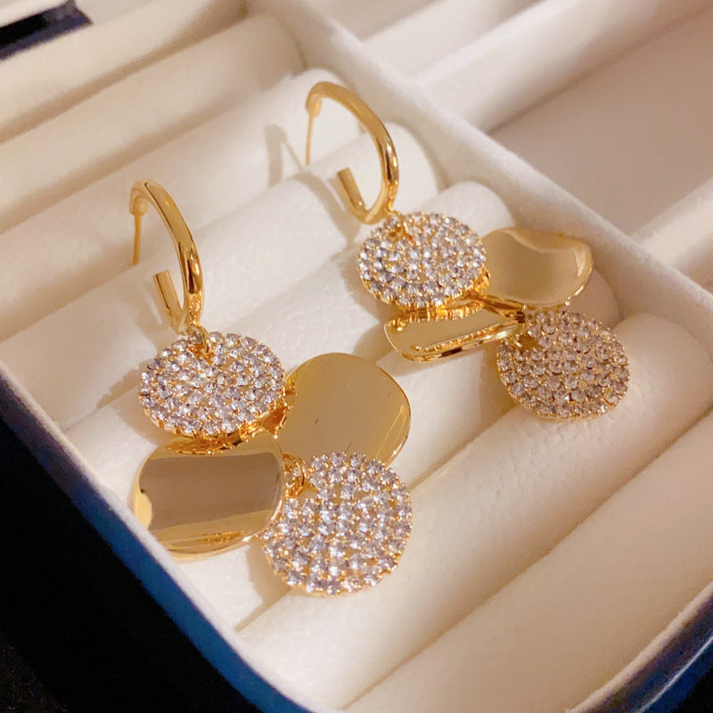 Crystal Radiance Round Tassel Earrings - Image 1