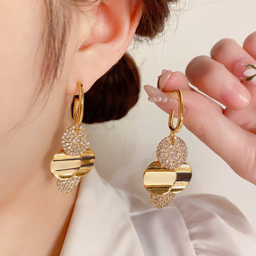 Crystal Radiance Round Tassel Earrings - Image 0