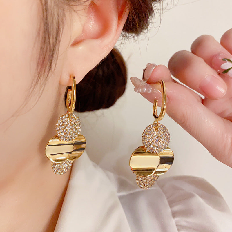Crystal Radiance Round Tassel Earrings - Image 0