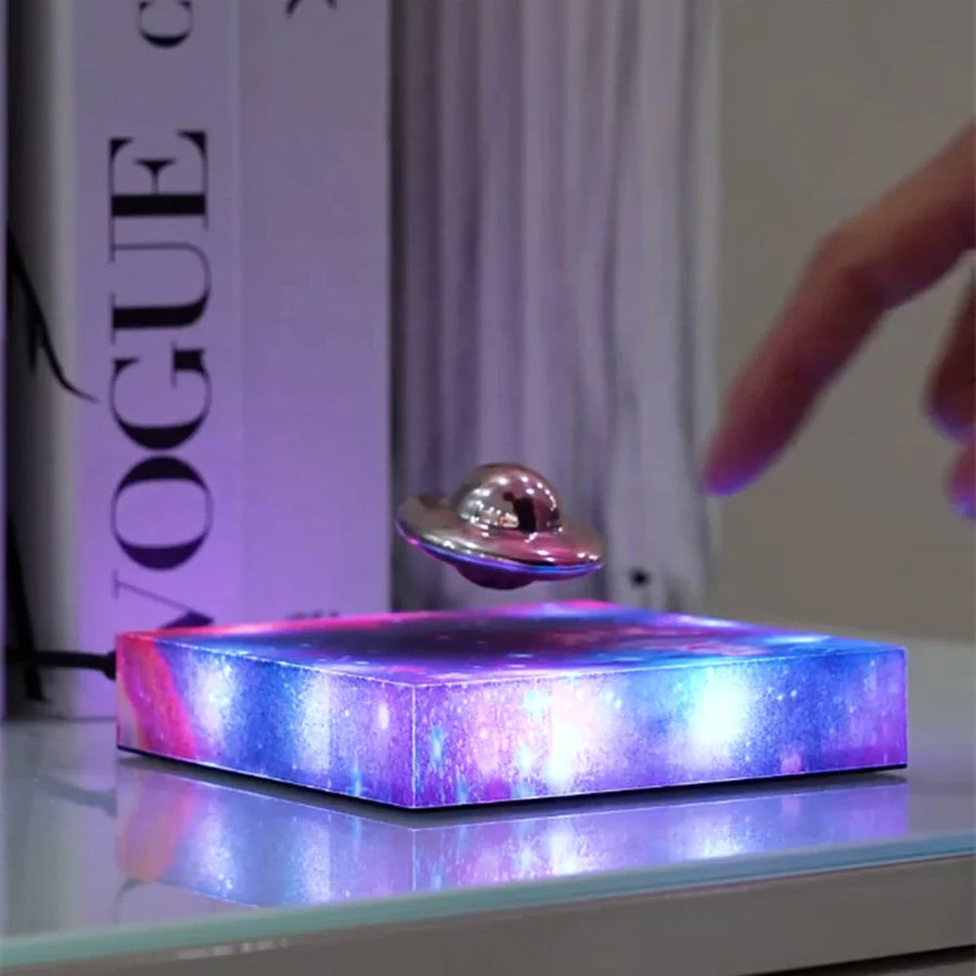 Magnetic Levitating Spaceship Rotating LED Night Lamp - Image 1