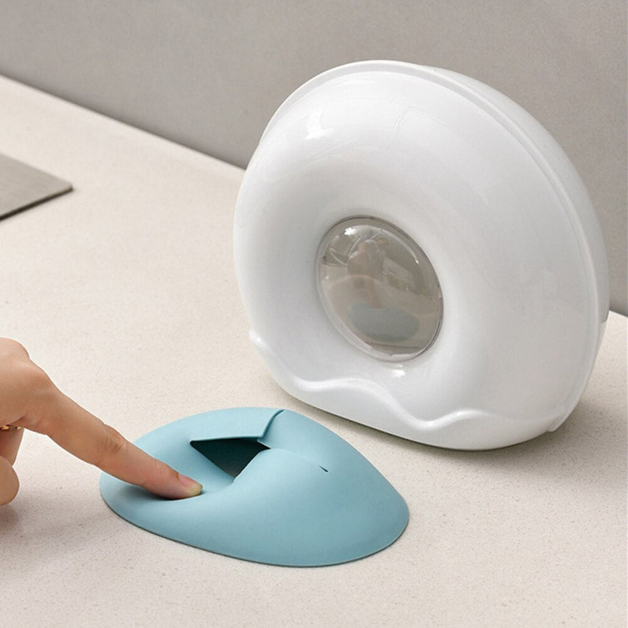 Self-Adhesive Plastic Bag Storage Dispenser - Image 1