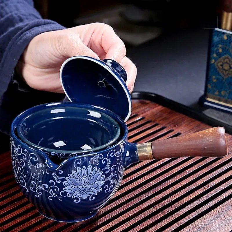 Traditional Harmony Ceramic Rotating Teapot - Image 1