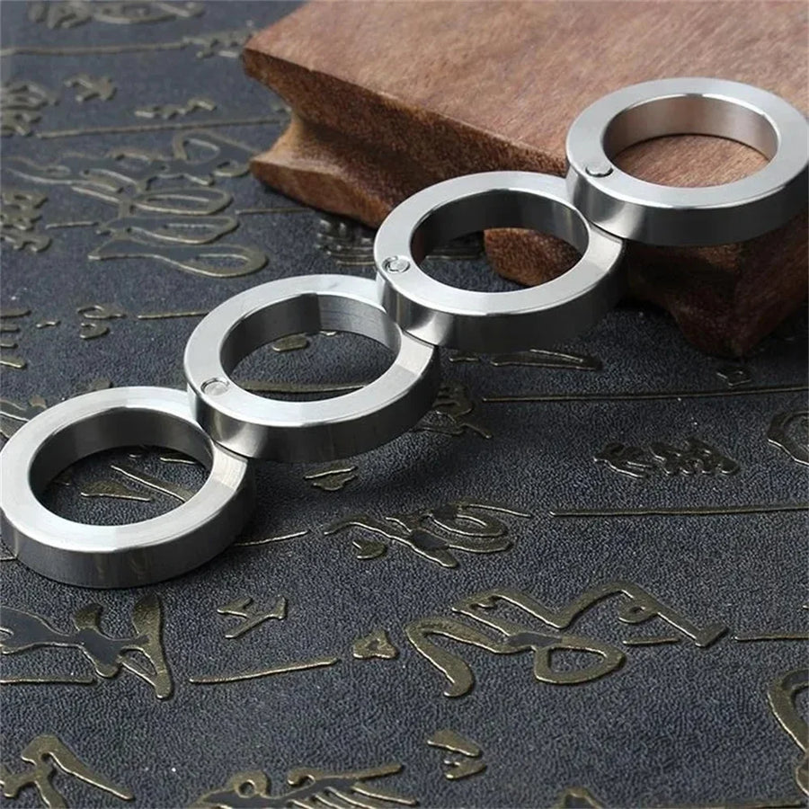 Stainless Steel Self-Defense Rotatable Foldable Ring - Image 1