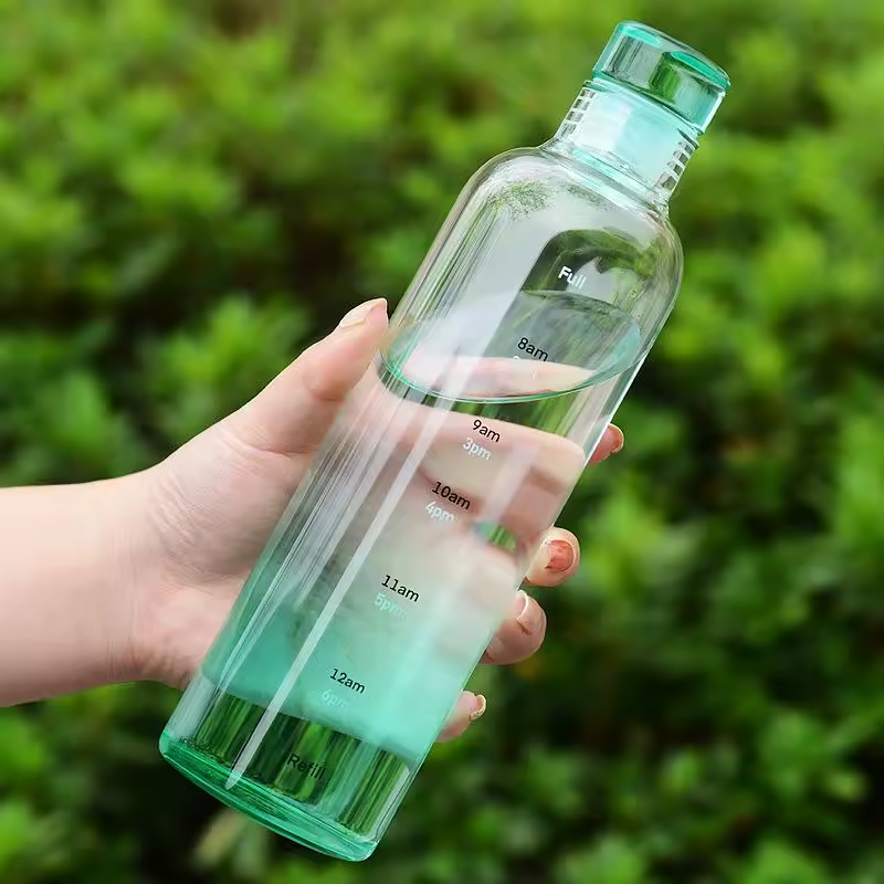 Glas-Trinkflasche mit Zeiteinteilung, hitzebeständig