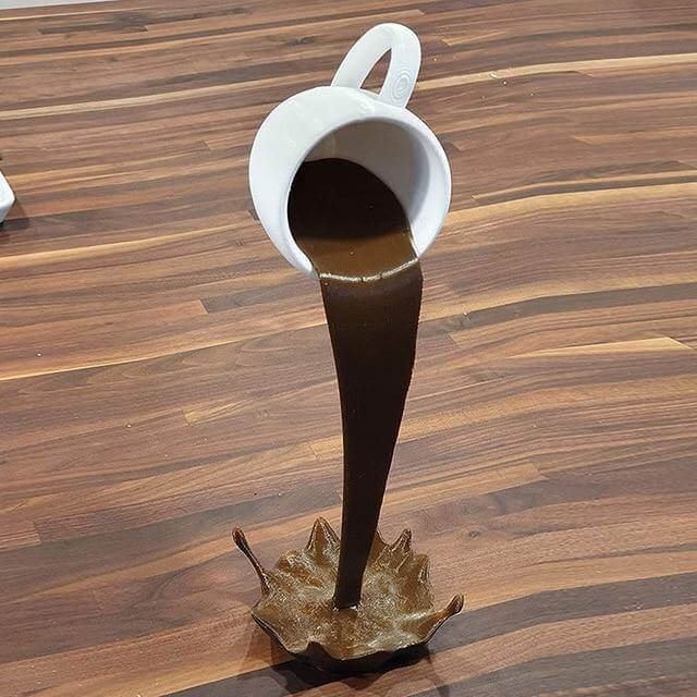 Floating Spilling Coffee Cup Decor - Image 1