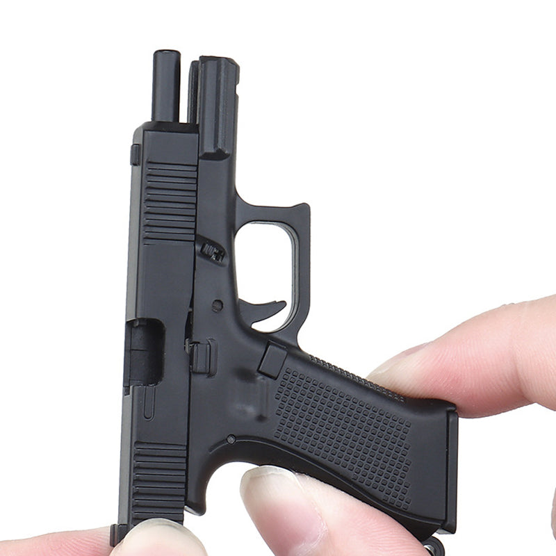 Mini Toy Pistol Shape Keychain - Image 1