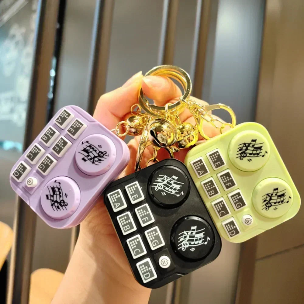“Mini DJ Turntable Toy Keychain: The Ultimate Gift for Music Lovers and Gadget Enthusiasts”