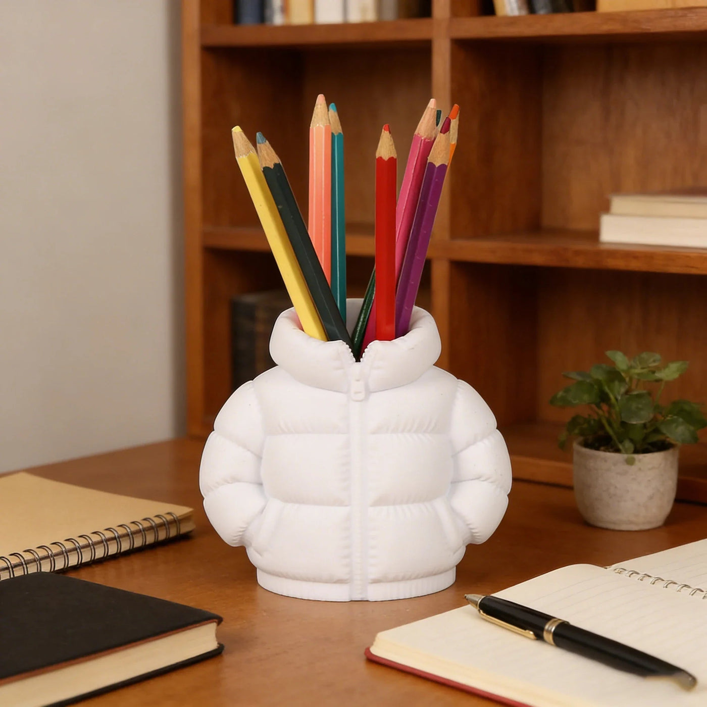 This Mini Puffer Jacket Pen Holder Is the Quirky Gift Your Desk Needs