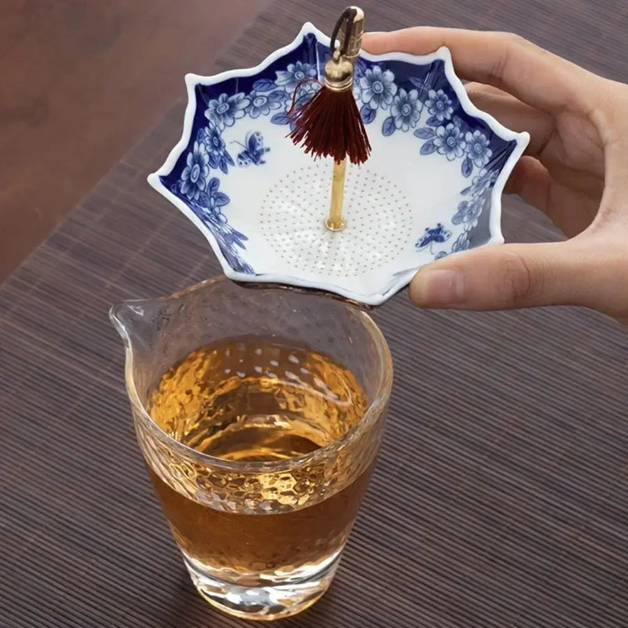 Traditional Floral Ceramic Umbrella Tea Strainer - Image 1