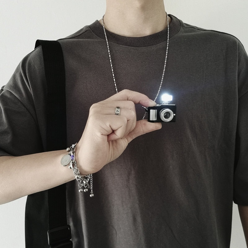 Vintage Camera Shaped Flashlight Necklace - Image 0