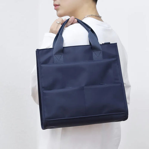 Metro Man High-Capacity Waterproof Handbag - Image 0