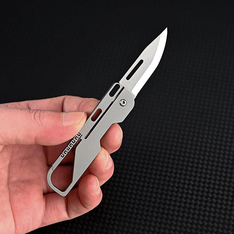 Mini Outdoor Foldable Titanium Knife Keychain - Image 1