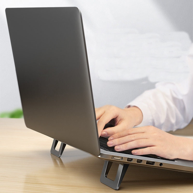 Mini Boost Foldable Invisible Laptop Riser Stand · Mavigadget