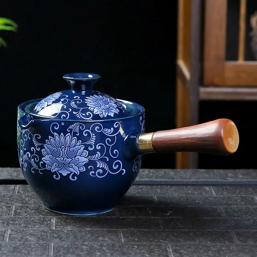 Traditional Harmony Ceramic Rotating Teapot - Image 0