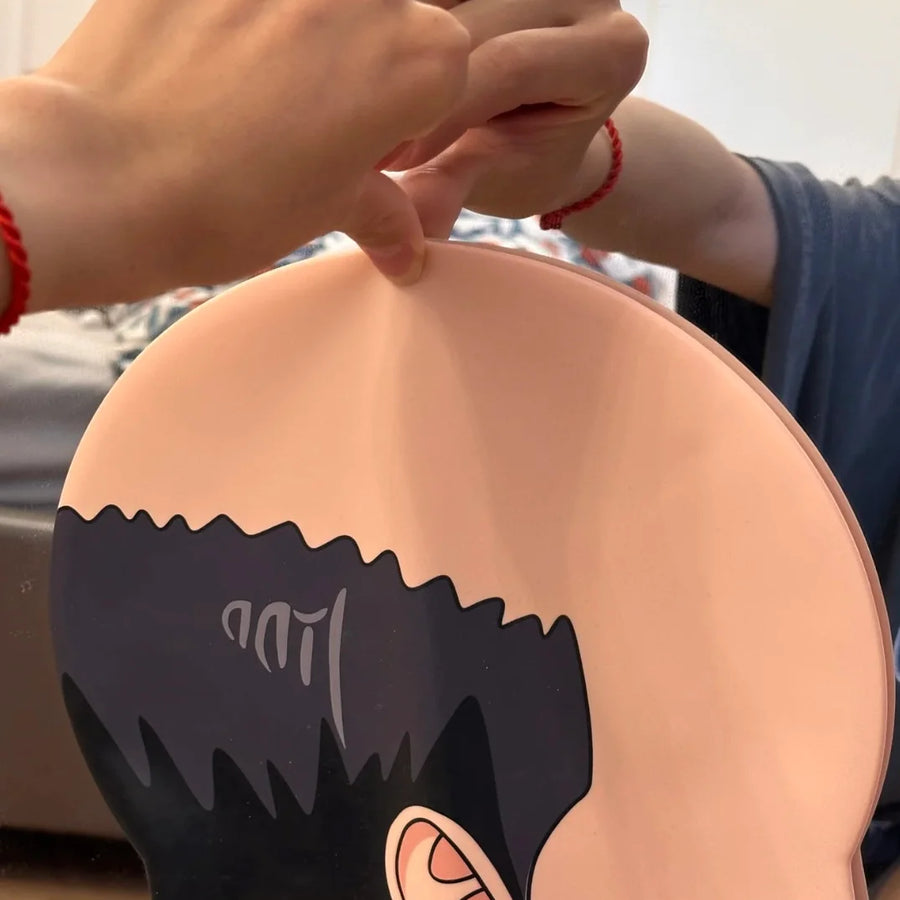 Original close-up of the swimming cap being stretched