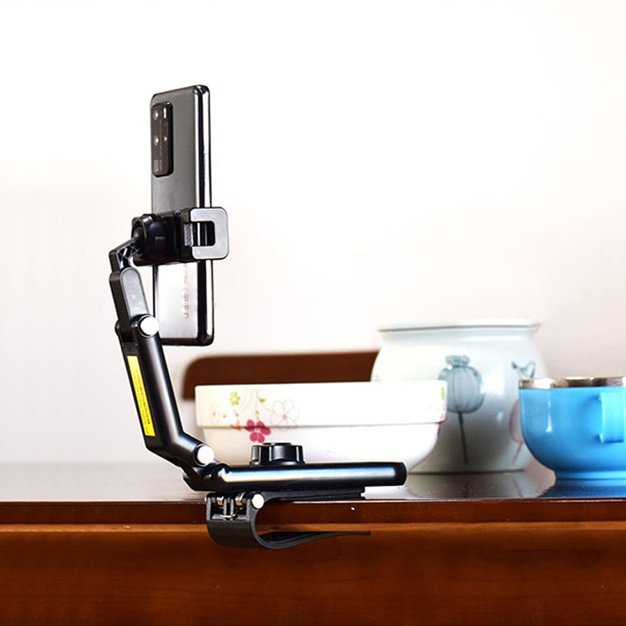 Sun Visor Car Rotating Phone Holder Clip - Image 0