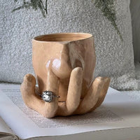 Artistic Hand Grip Base Unique Coffee Mug - Image 0