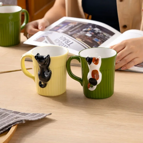 Hanging in There Cat Ceramic Mug - Image 0