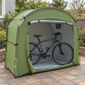Small green shelter · bike parked across the width