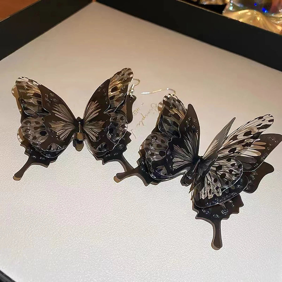 Black Hollow Butterfly Dangle Earrings - Image 3