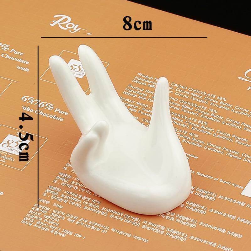 Hand Shape Ceramic Egg Cup Holder - Image 1