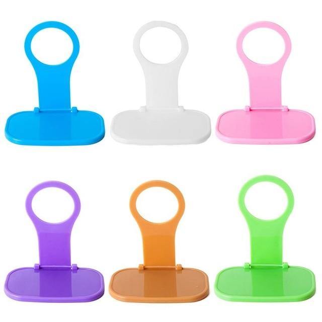 Universal Foldable Wall Outlet Phone Charger Holder - Image 1