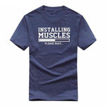 Installing Muscles Funny T-shirt