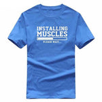 Installing Muscles Funny T-shirt