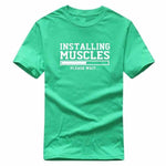 Installing Muscles Funny T-shirt