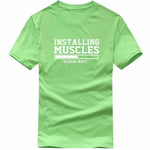 Installing Muscles Funny T-shirt