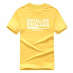 Installing Muscles Funny T-shirt