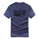 Installing Muscles Funny T-shirt