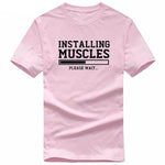 Installing Muscles Funny T-shirt