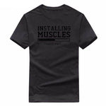 Installing Muscles Funny T-shirt