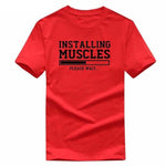 Installing Muscles Funny T-shirt