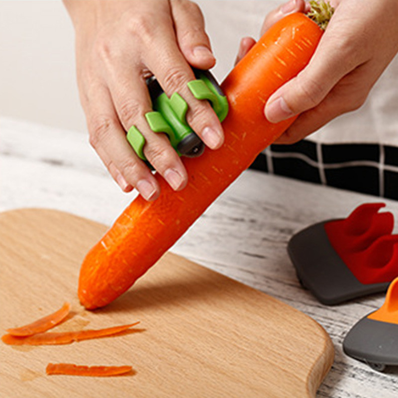 Double Finger Vegetable Peeler - Image 0